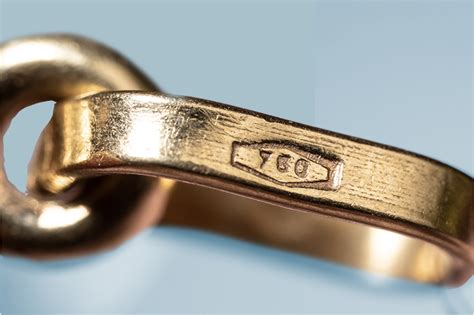 what do the marks on jewelry mean